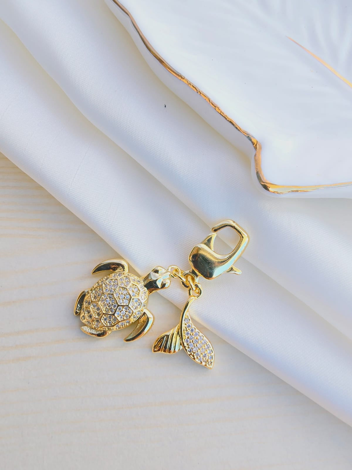 Cadena clip con dijes