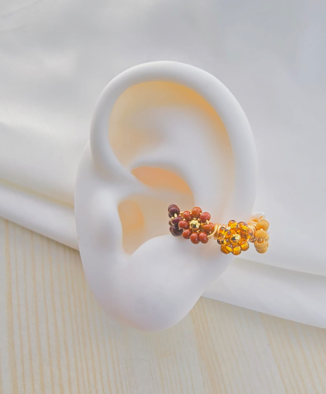 Earcuffs tejidos flor