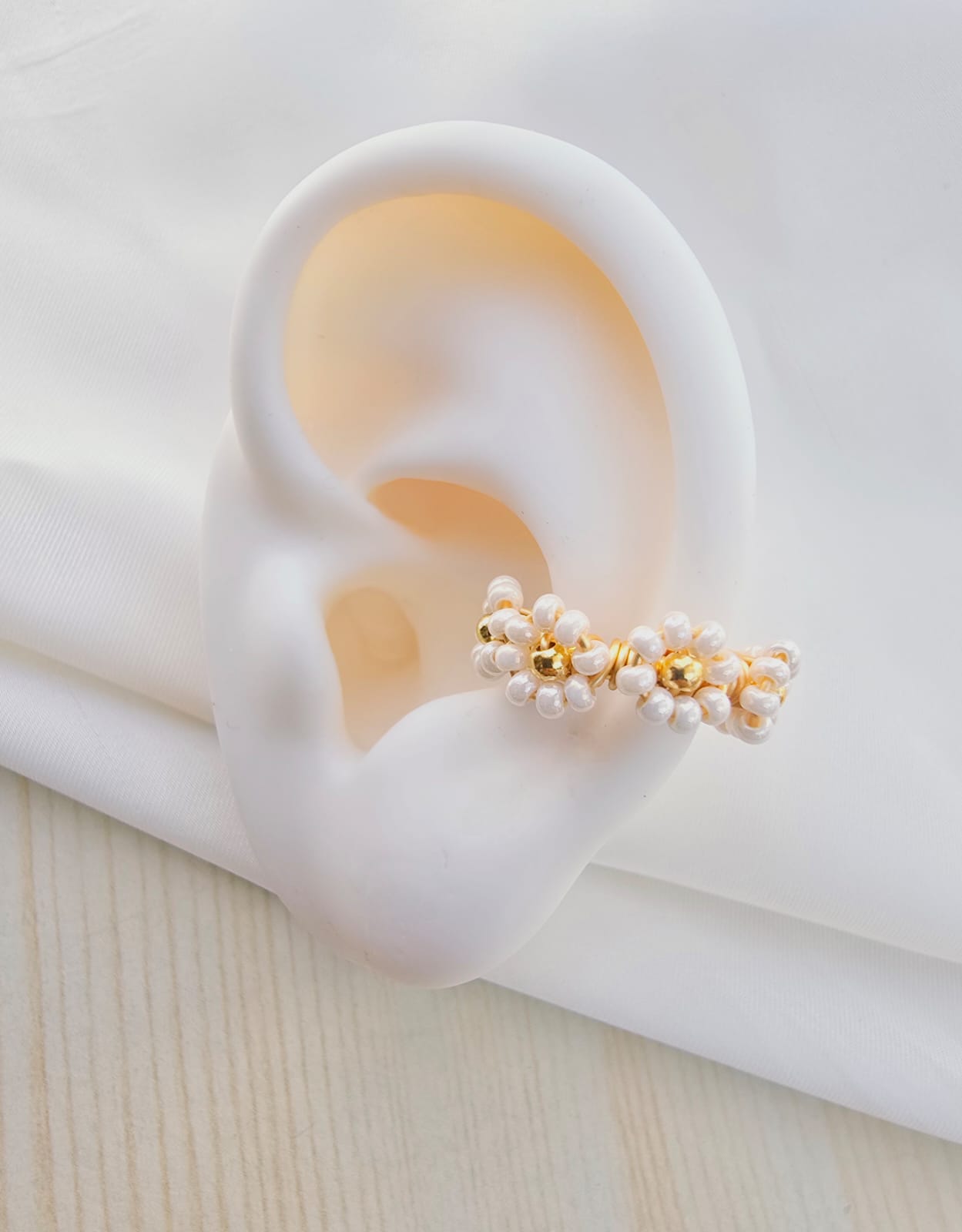 Earcuffs tejidos flor