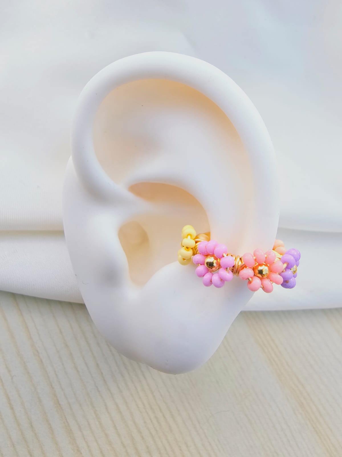 Earcuffs tejidos flor