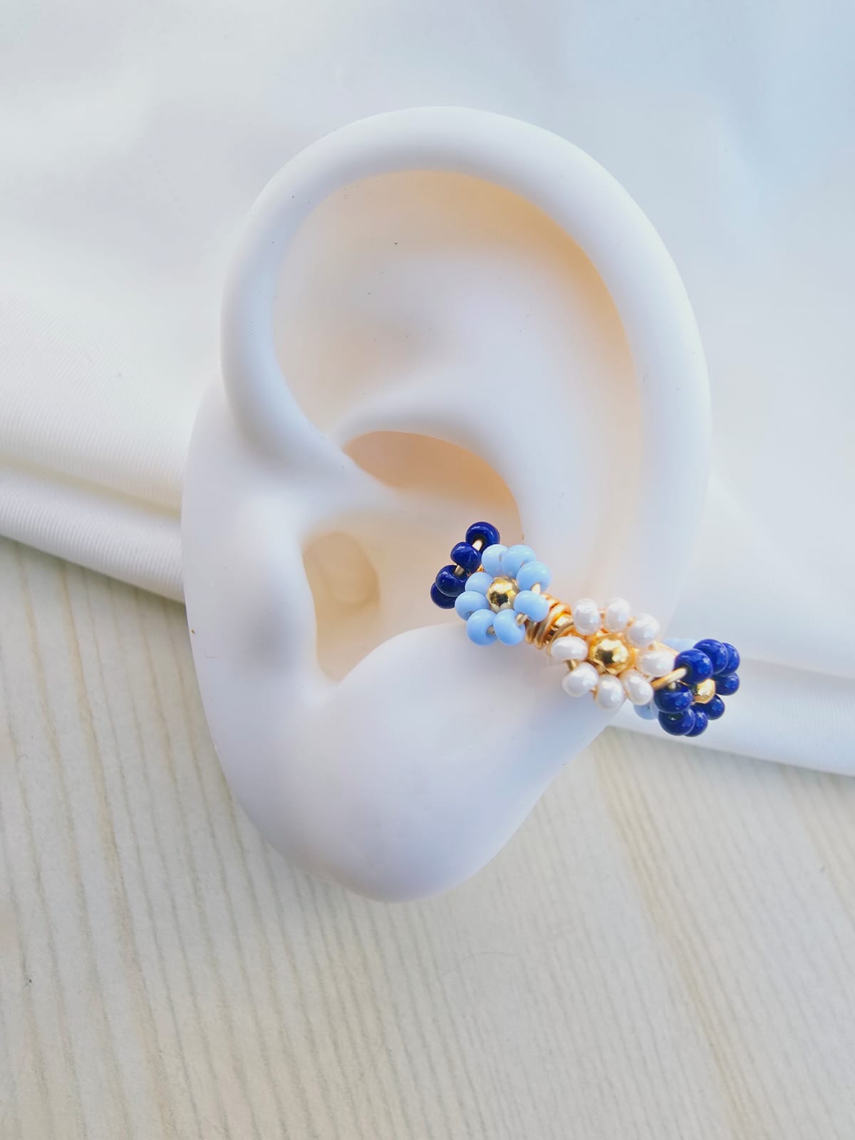 Earcuffs tejidos flor