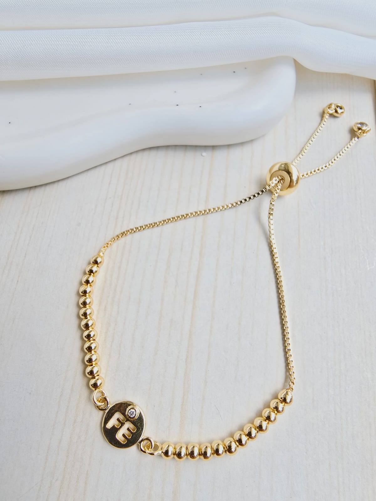 Pulsera balin con dije en rodio