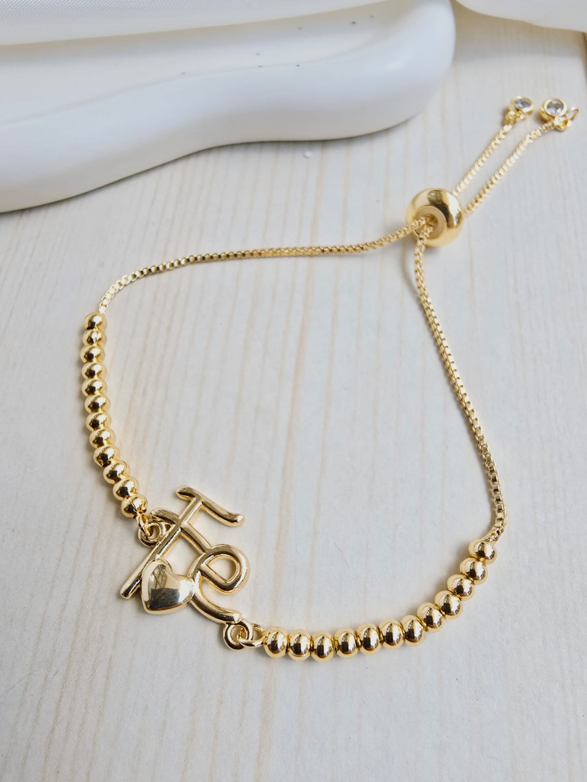 Pulsera balin con dije en rodio