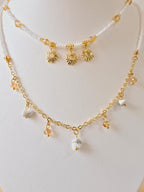 Cadena doble blanco con dijes