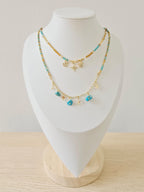 Cadena doble turquesa con dijes