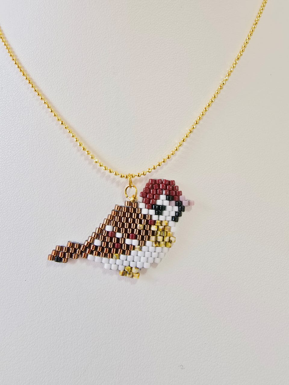 Cadena son dije de ave tejida en miyuky