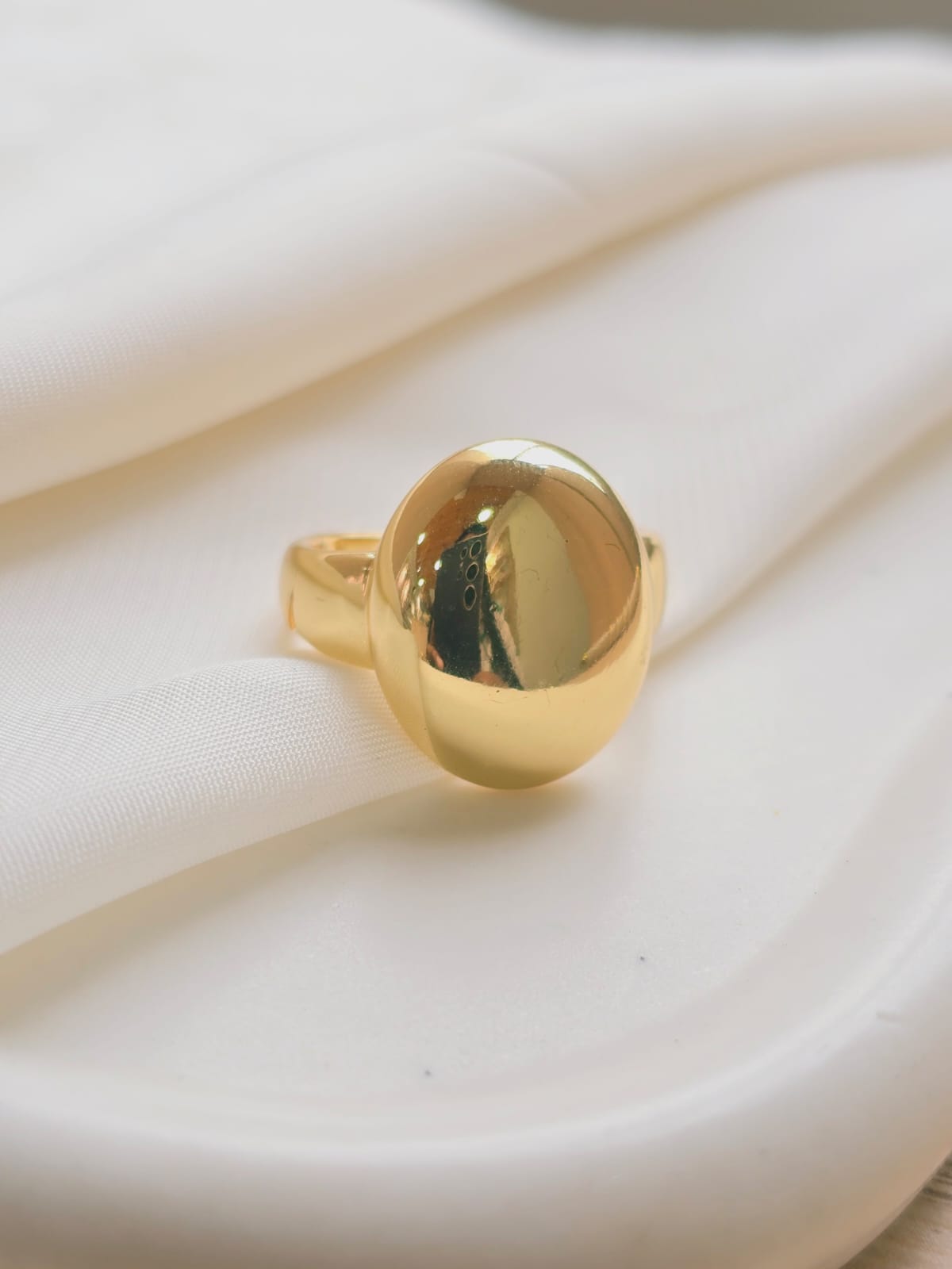 Anillo esfera dorada