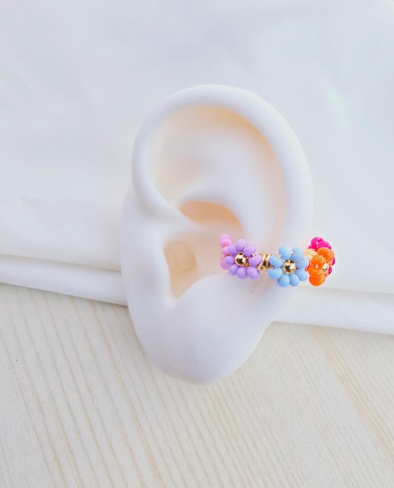 Earcuffs tejidos flor