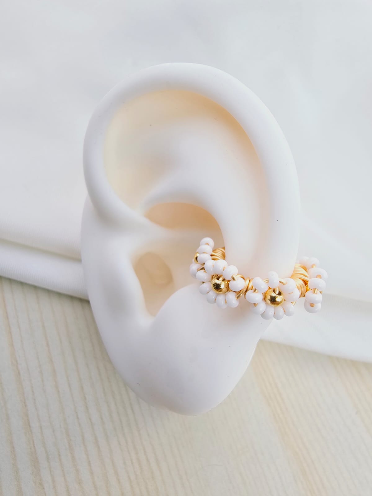 Earcuffs tejidos flor