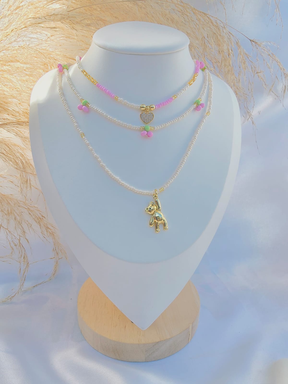 Cadena triple cerecitas rosadas dije oso