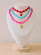 Gargantillas de perlas con dijes