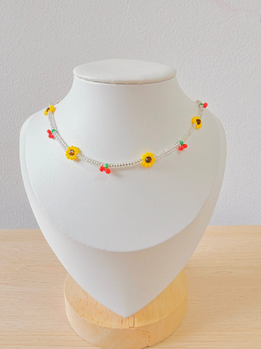 Gargantilla tejida flor cerezas