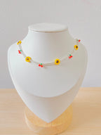 Gargantilla tejida flor cerezas